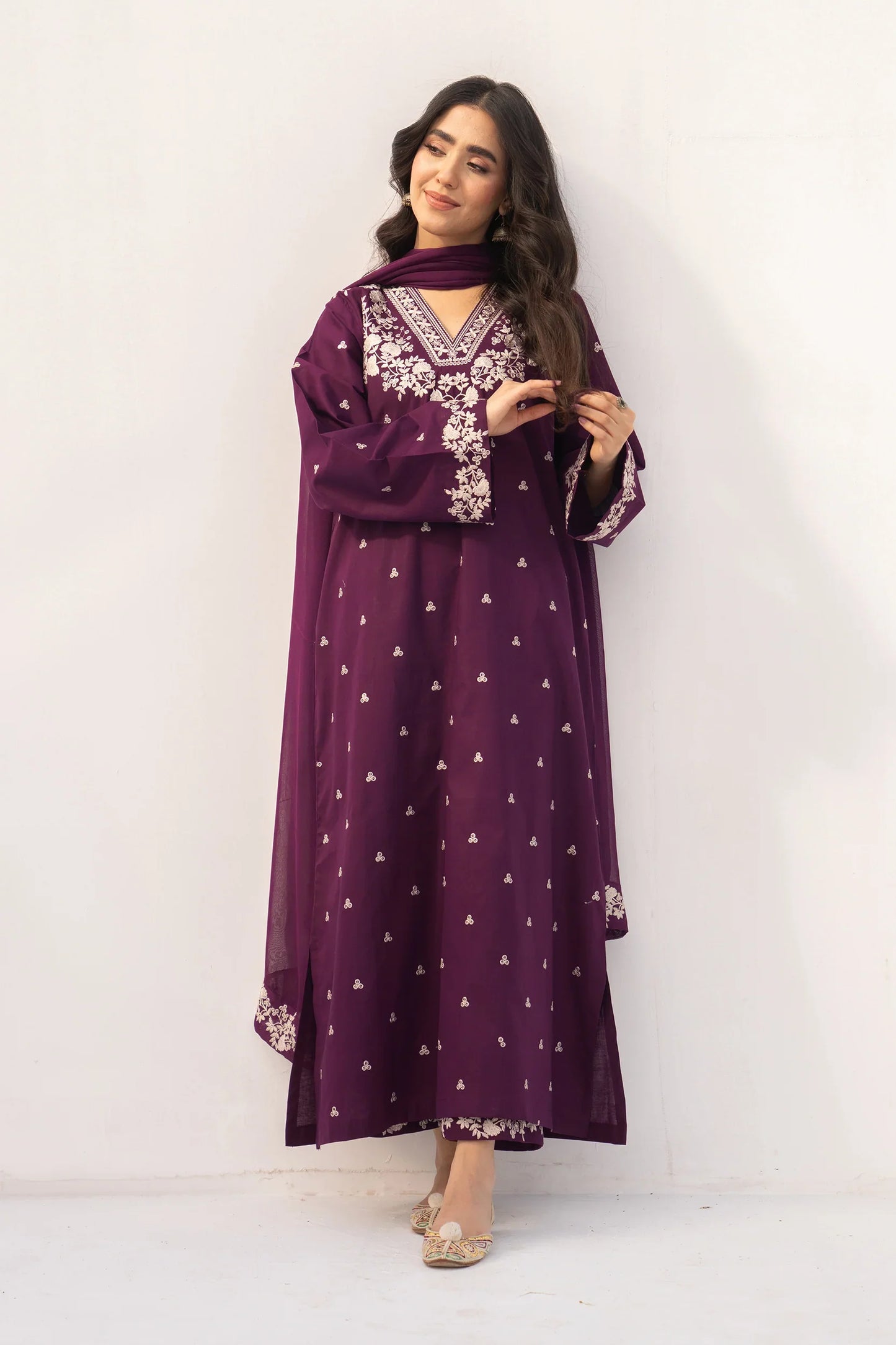 Shai Noor Amber 3-piece embroidered lawn suit for women, featuring intricate embroidery on the top, dupatta, and matching trousers.