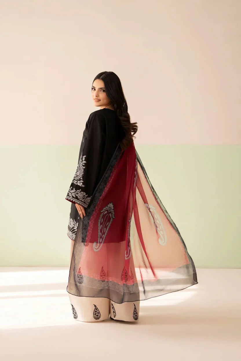Shai Noor Gul e Siyah 3-piece embroidered lawn suit for women, featuring intricate embroidery on black fabric with matching dupatta and shalwar.