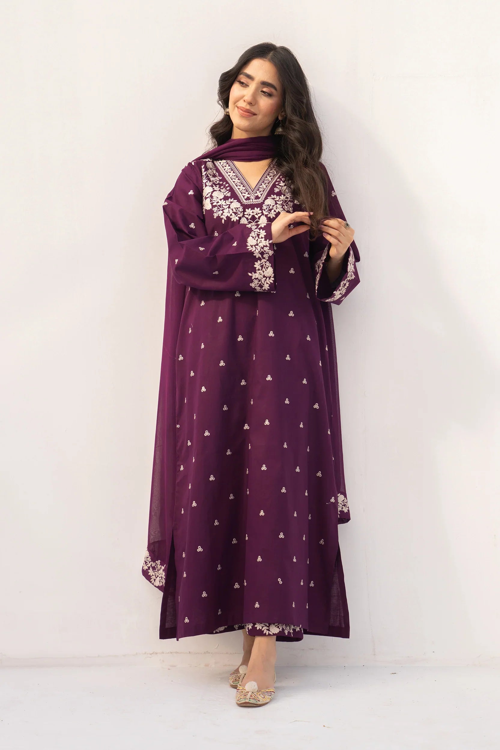 Shai Noor Amber 3-piece embroidered lawn suit for women, featuring intricate embroidery on the top, dupatta, and matching trousers.
