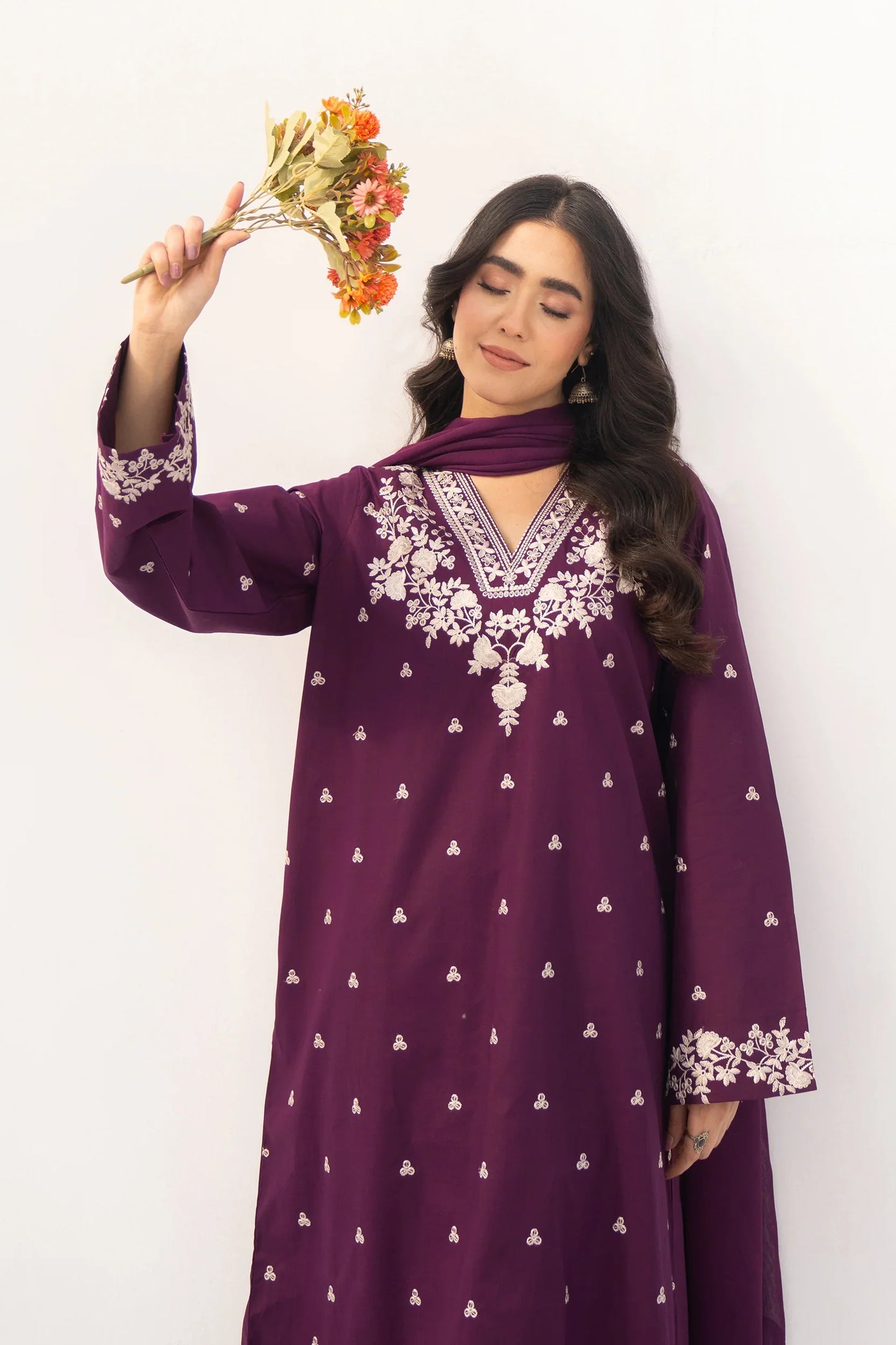 Shai Noor Amber 3-piece embroidered lawn suit for women featuring intricate embroidery on fabric and matching dupatta.