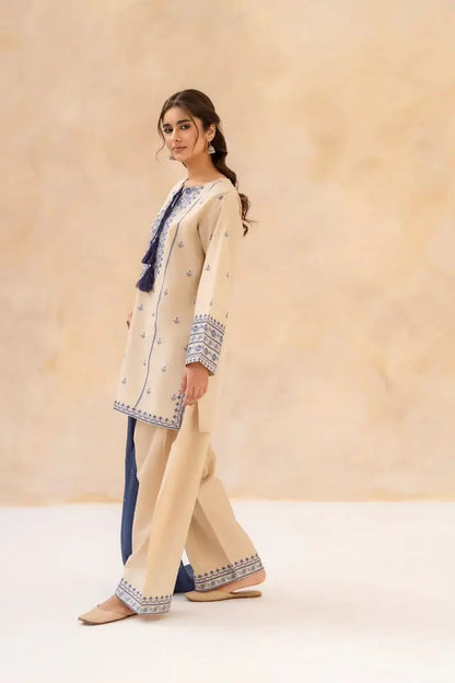 Side view of Sundari embroidered shirt with trouser and chiffon dupatta by Shai Noor.