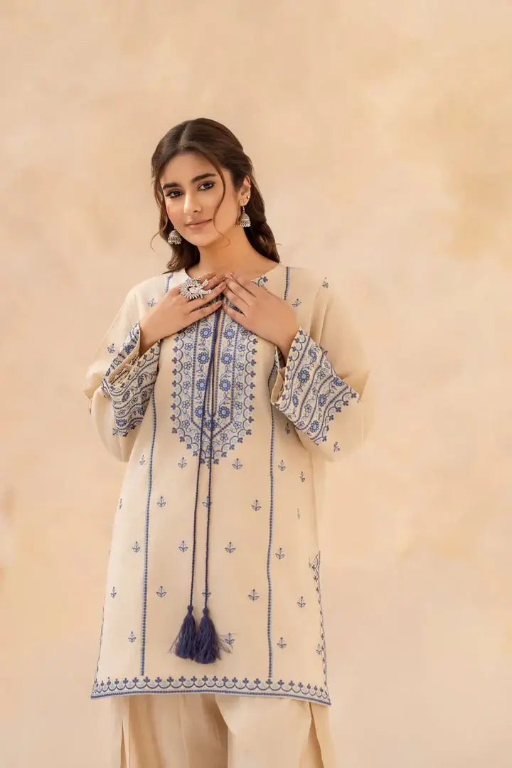 Close-up of neckline embroidery on Sundari embroidered shirt by Shai Noor.
