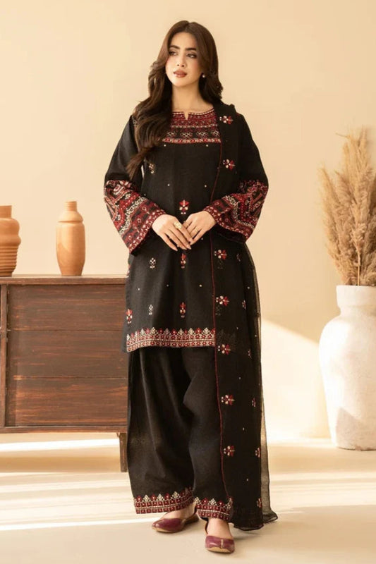 Shai Noor 3-piece embroidered lawn suit for women featuring intricate embroidery on fabric, made in Pakistan.