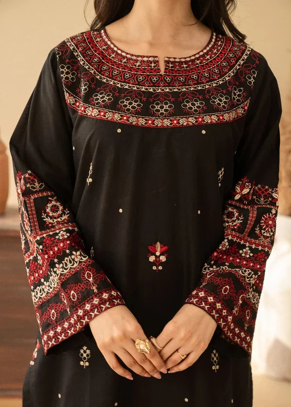 Shai Noor 3-piece embroidered lawn suit for women, featuring intricate embroidery on the top, dupatta, and matching trousers.